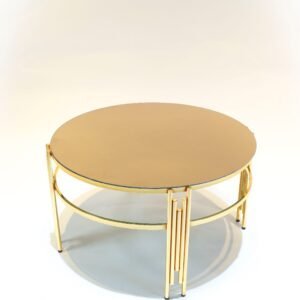 Round gold coffee table with reflective top and cylindrical frame featuring vertical bars.