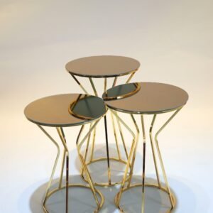 Three round nesting tables with mirrored tops, gold metal frames, arranged in a cluster.