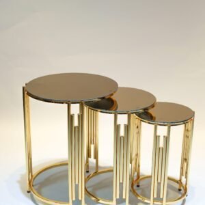 Three round nesting tables with mirrored tops, gold frames, vertical bar supports.