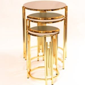 Luxury gold nesting coffee table  Modern nesting side tables  Mirrored glass coffee table set  Round gold accent tables  Small space coffee table  Elegant living room tables  Stackable coffee table set  Contemporary gold table furniture  3 piece nesting table  High-end coffee table design 